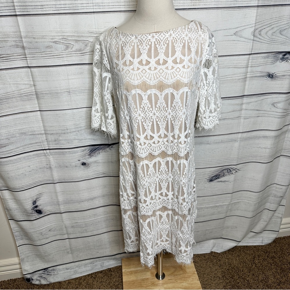 White lace boat neck dress, short sleeves, tan underlay